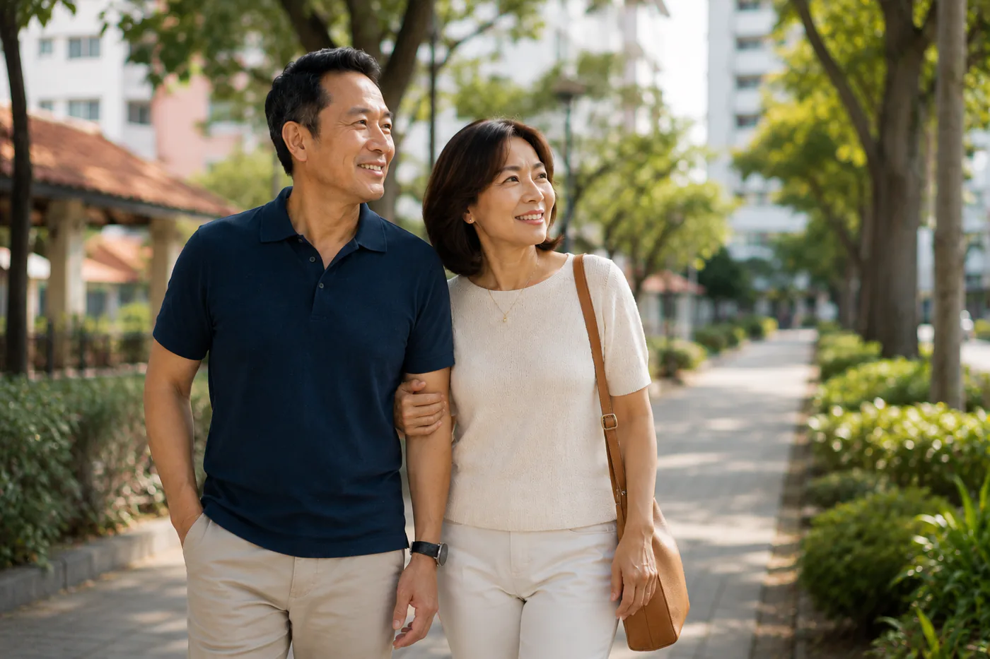 Mature Asian couple walking together in a Singapore neighbourhood